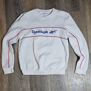 Vintage Reebok Men's White Crewneck Sweater with Blue and Red Accents
